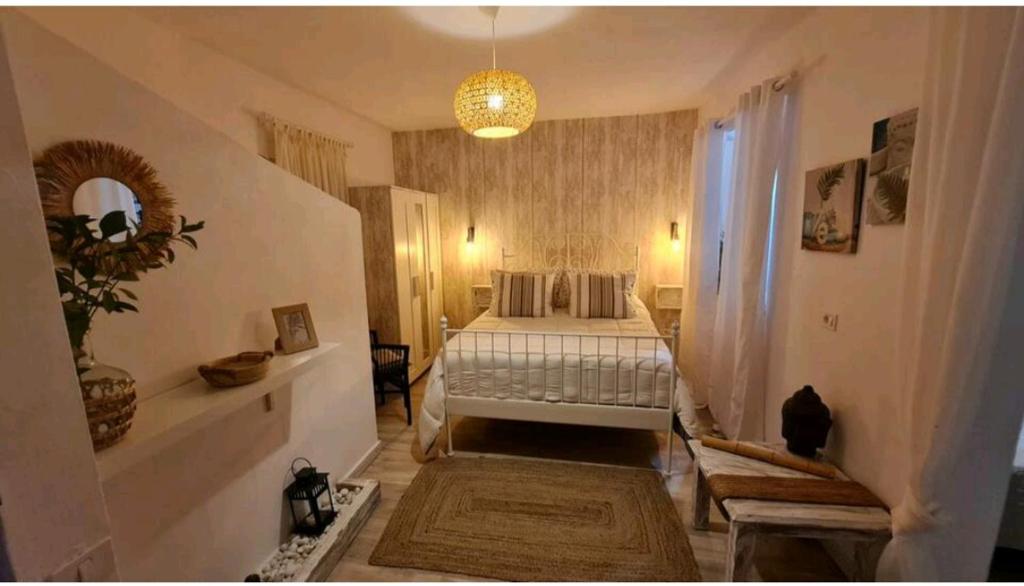 Łóżko lub łóżka w pokoju w obiekcie GRAN CANARIA Oasis La Guancha