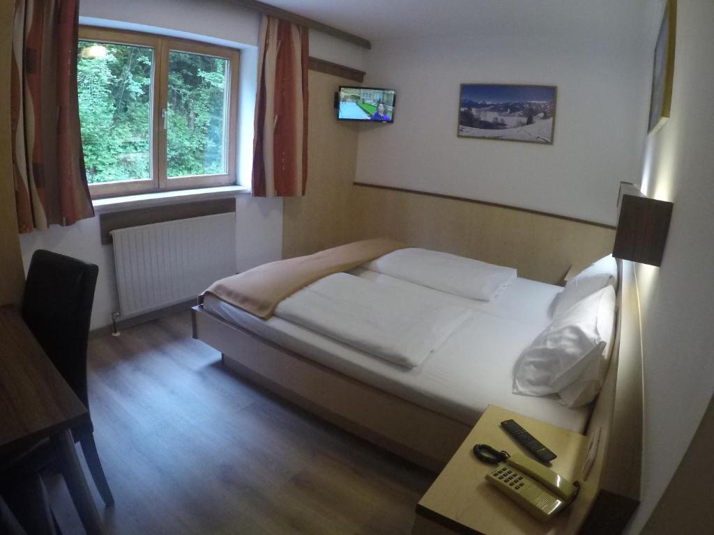 Postel nebo postele na pokoji v ubytování Hotel-Garni Seestrand