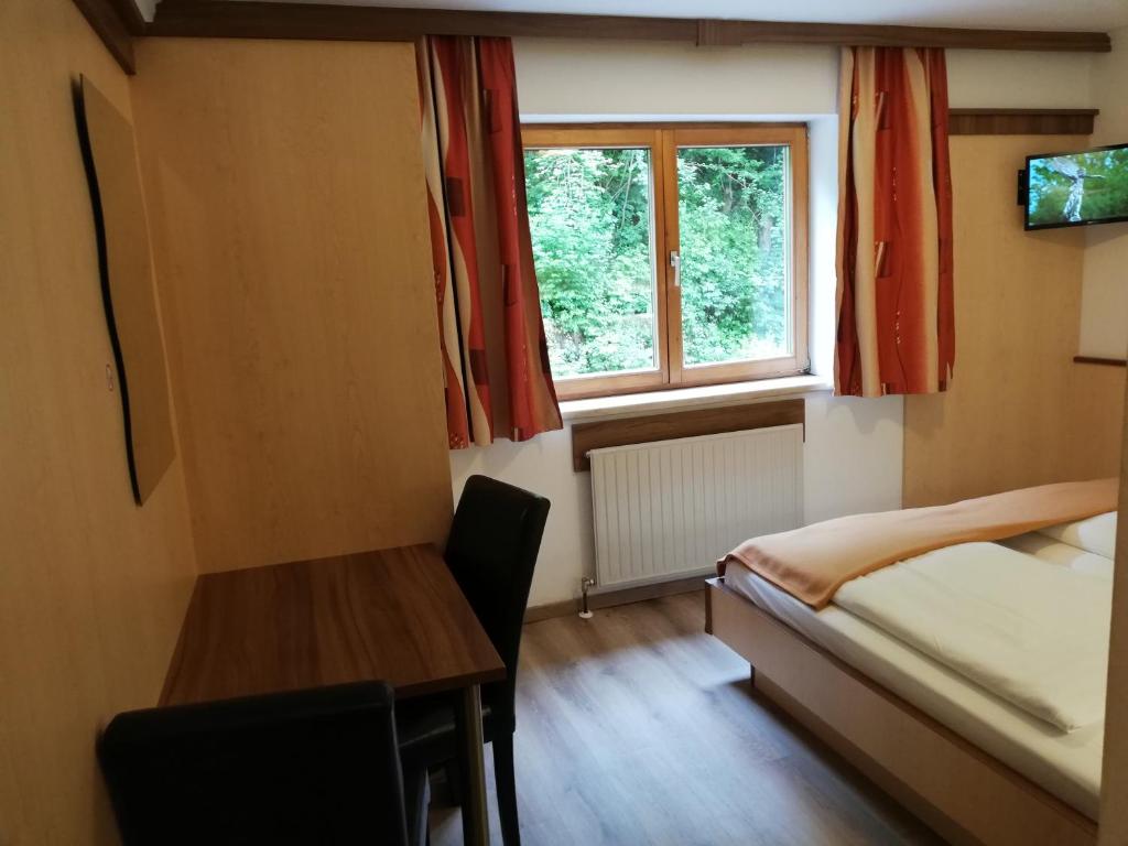 Postel nebo postele na pokoji v ubytování Hotel-Garni Seestrand