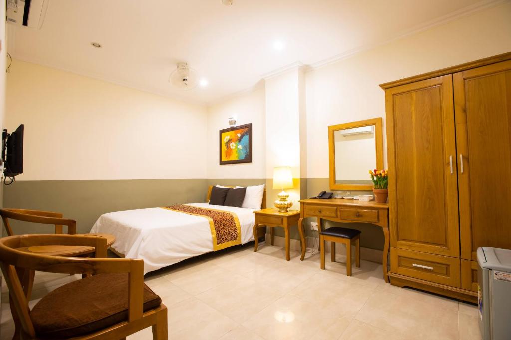Кровать или кровати в номере Atana Hotel