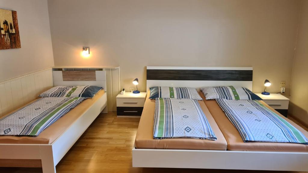 Postel nebo postele na pokoji v ubytování My Appartement - Haus Waldeck