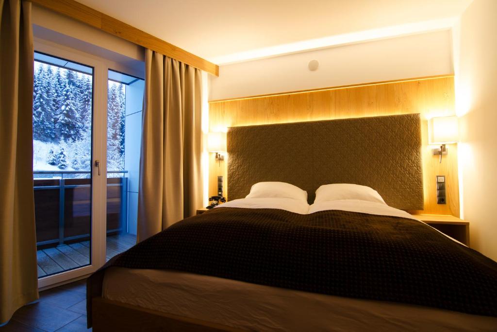 Postel nebo postele na pokoji v ubytování Hotel Victoria - adults only