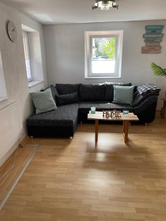 Posezení v ubytování Ferienhaus zum Ulfenbachtal