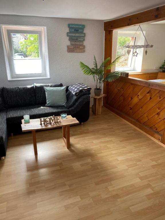 Posezení v ubytování Ferienhaus zum Ulfenbachtal