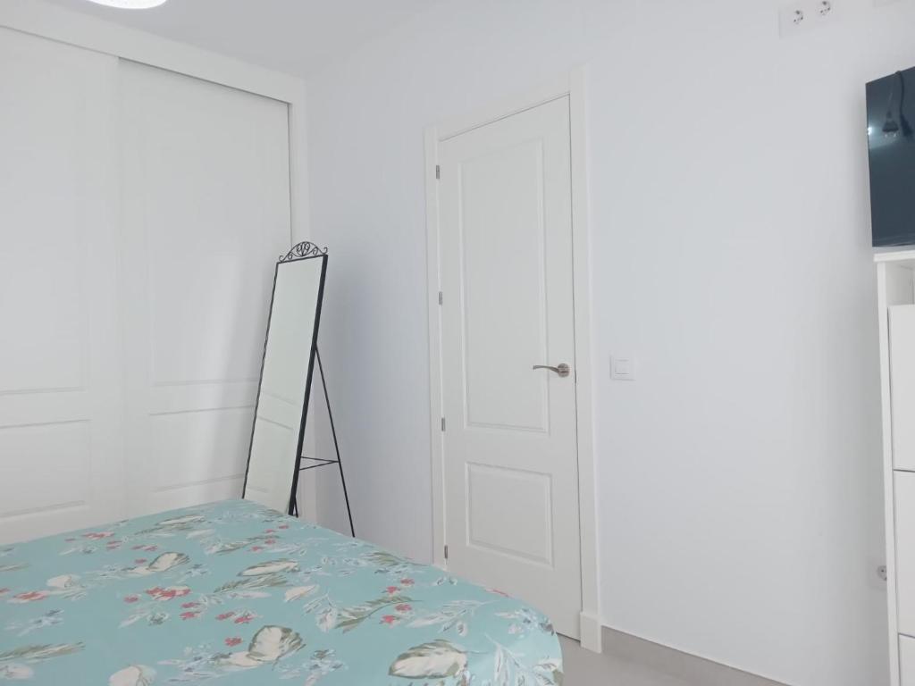 Posteľ alebo postele v izbe v ubytovaní APARTAMENTO SAN JUAN