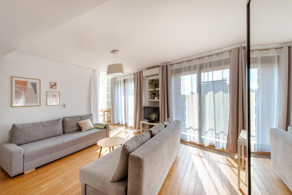 Posedenie v ubytovaní Spacious apartment close to Main Station / Galeria Krakowska