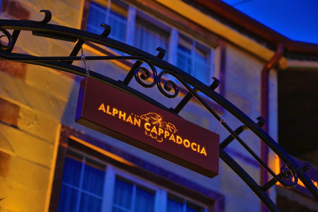 a sign that reads alham carapoda in front of a building at Alphan Cappadocia in Uçhisar