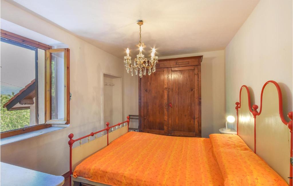 Posteľ alebo postele v izbe v ubytovaní 4 Bedroom Beautiful Home In Tiglieto