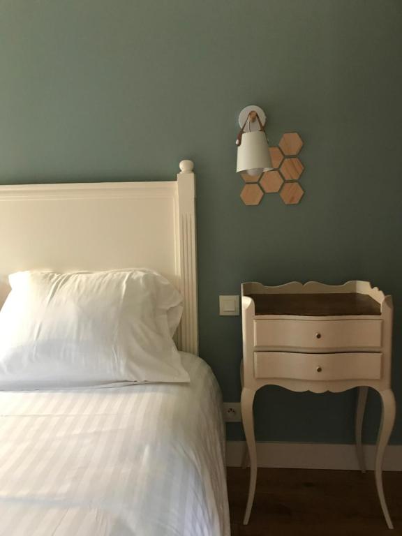 Postel nebo postele na pokoji v ubytování Fleur & Mer