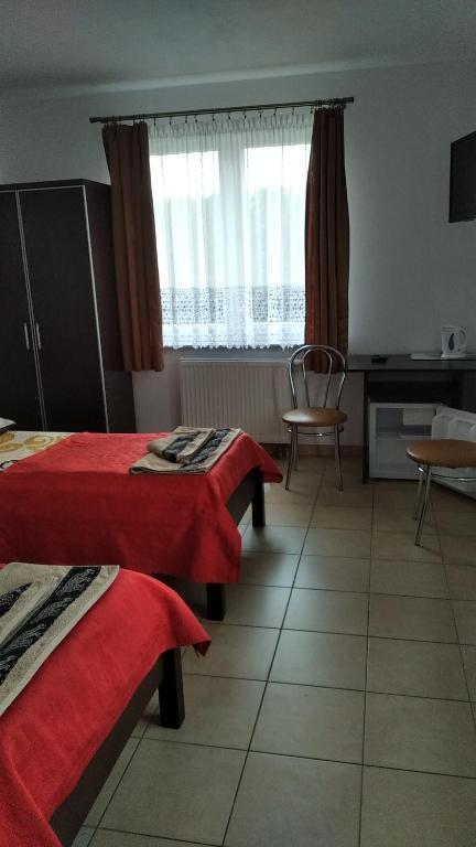 Postel nebo postele na pokoji v ubytování Willa Aleksander