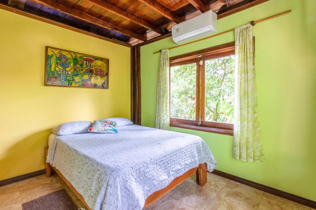 Postel nebo postele na pokoji v ubytování casa chilamates