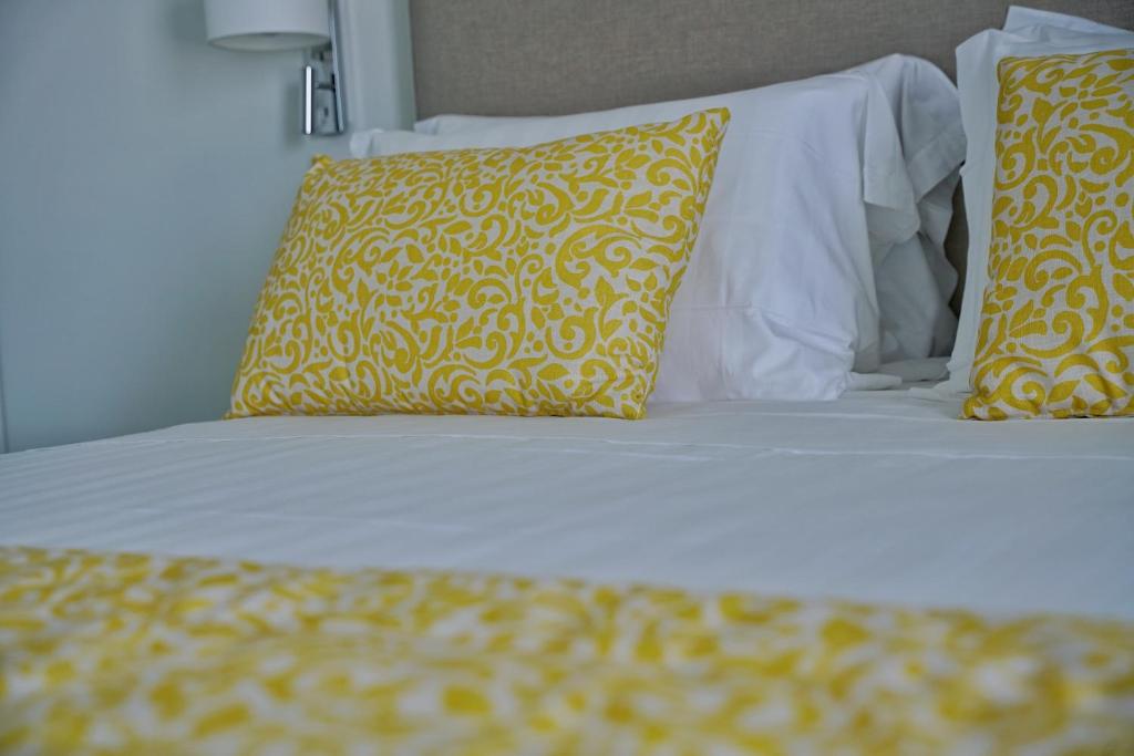 Postel nebo postele na pokoji v ubytování Casa Adelaide
