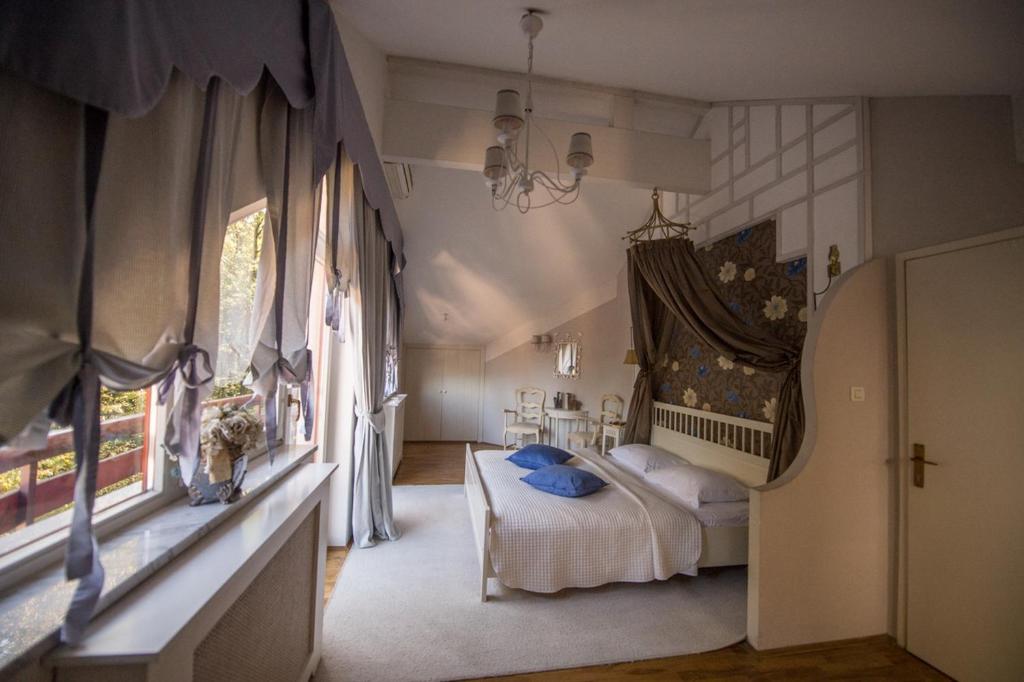 Postel nebo postele na pokoji v ubytování Guesthouse Trajbar Team