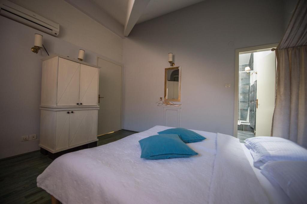 Postel nebo postele na pokoji v ubytování Guesthouse Trajbar Team