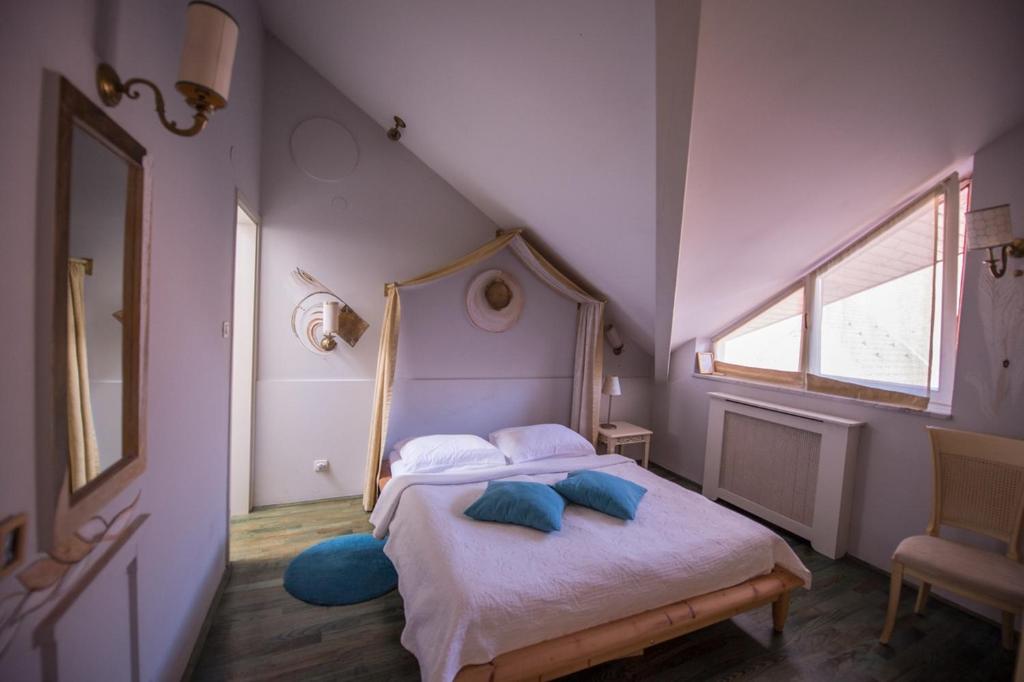 Postel nebo postele na pokoji v ubytování Guesthouse Trajbar Team