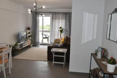 Televízia a/alebo spoločenská miestnosť v ubytovaní Apartment At The Beach -La Malagueta-Free Parking-