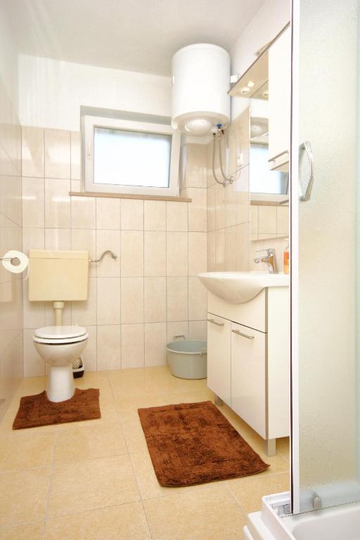 Koupelna v ubytování Apartments by the sea Lumbarda, Korcula - 9330