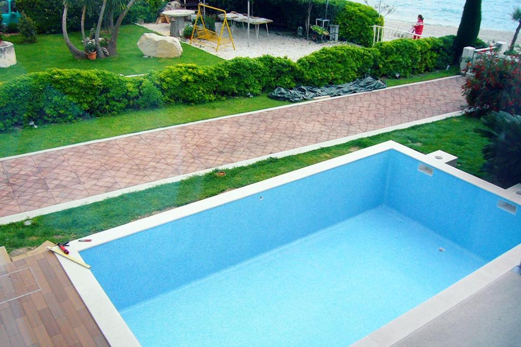 Fotografia z galérie ubytovania Seaside luxury villa with a swimming pool Podstrana, Split - 9466 v destinácii Podstrana
