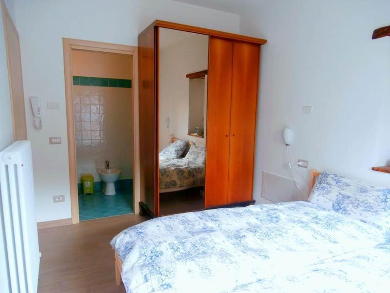 Posteľ alebo postele v izbe v ubytovaní B&B della Contrada Varenna
