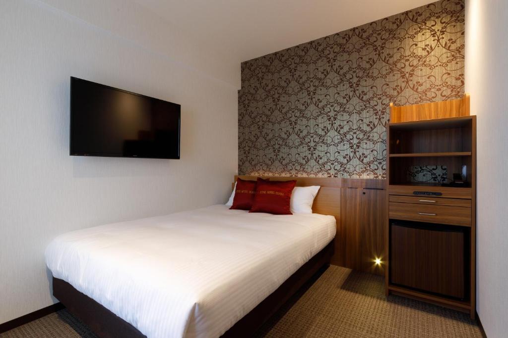 Postel nebo postele na pokoji v ubytování Five Hotel Osaka