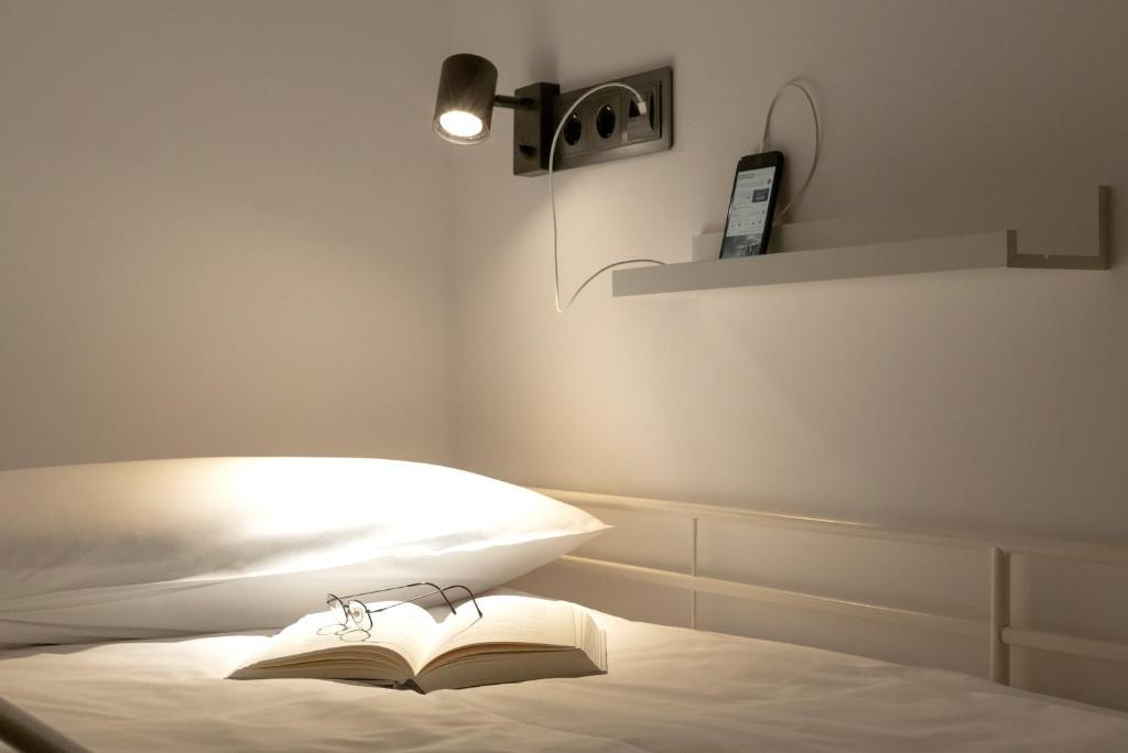 Postel nebo postele na pokoji v ubytování Woohoo Rooms Boutique Gran Vía
