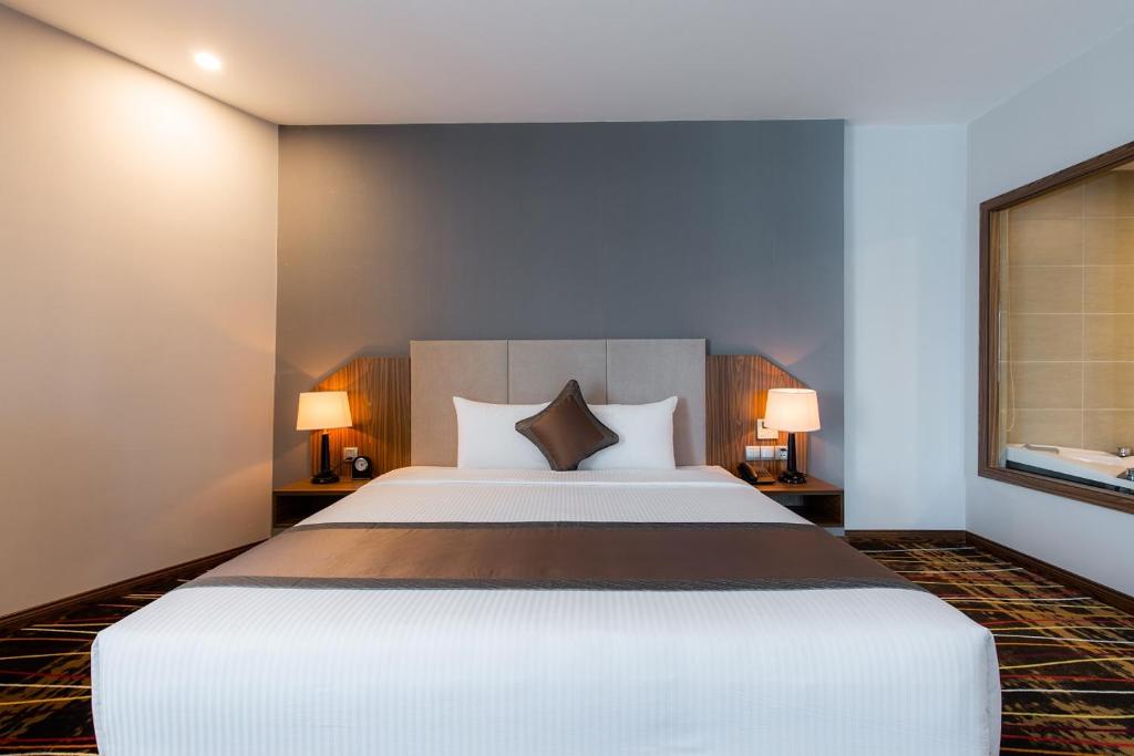 Giường trong phòng chung tại Muong Thanh Luxury Vien Trieu Nha Trang