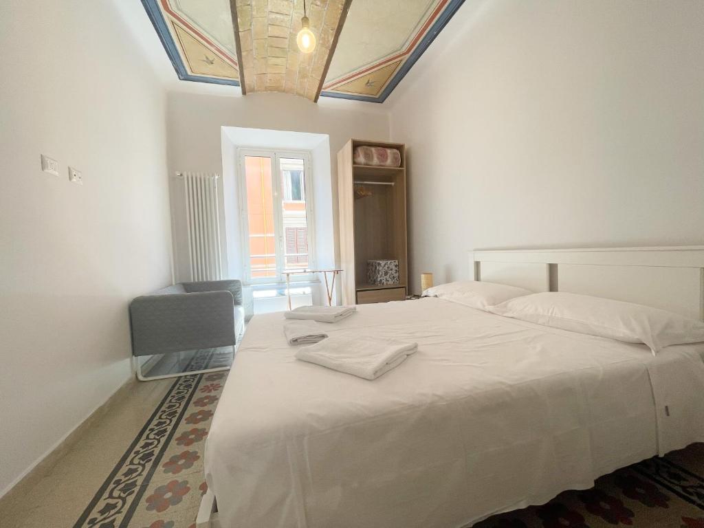 Łóżko lub łóżka w pokoju w obiekcie CAIROLI BOUTIQUE APARTMENT
