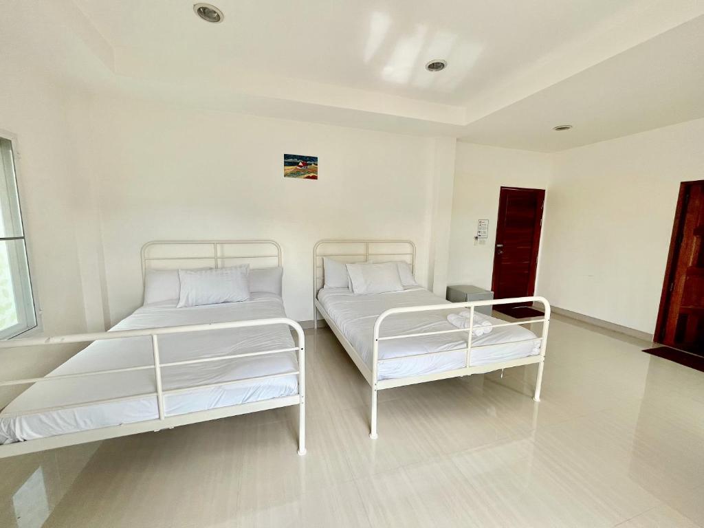 Postel nebo postele na pokoji v ubytování Home JANO