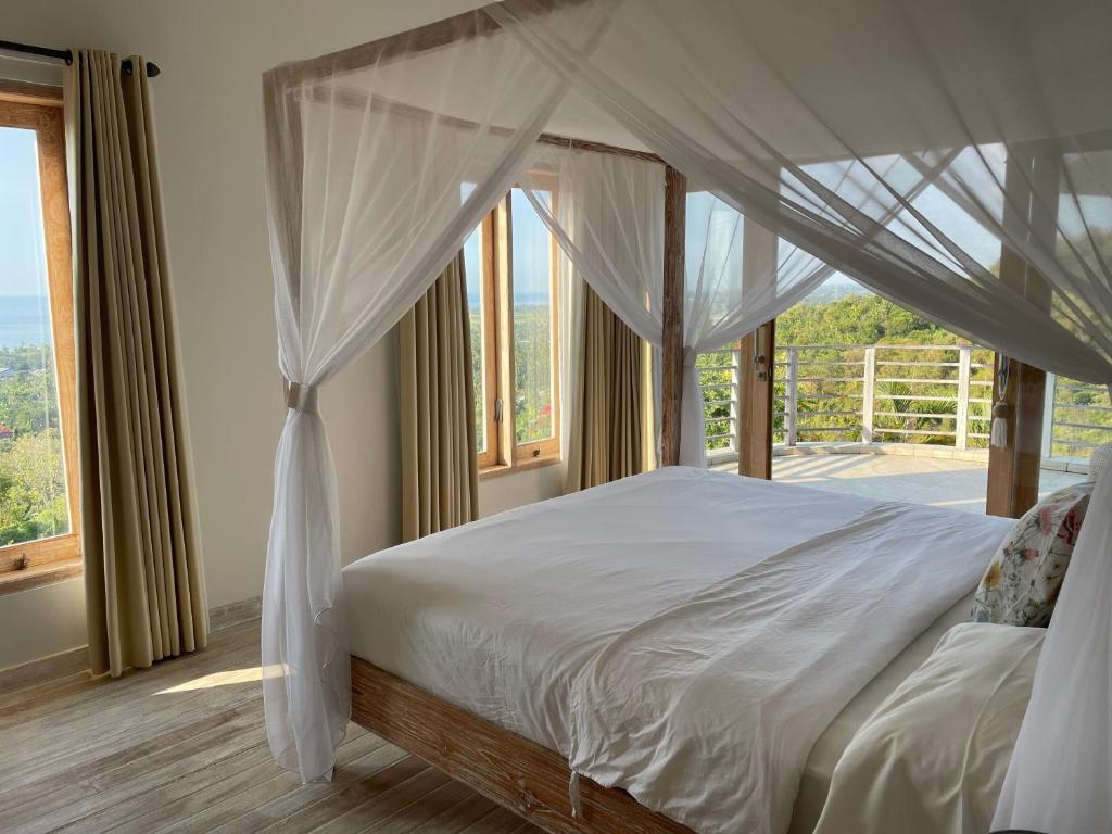Postel nebo postele na pokoji v ubytování Villa Reva Bali