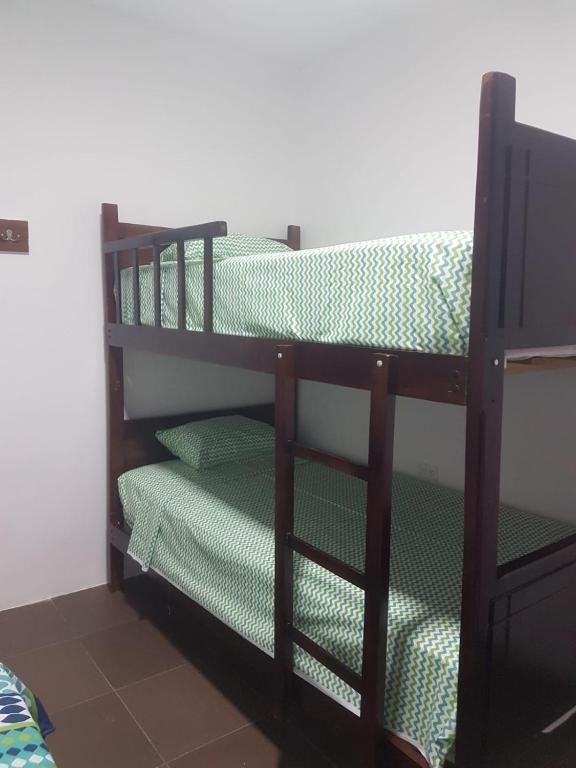 Postel nebo postele na pokoji v ubytování La Posada de Joselito