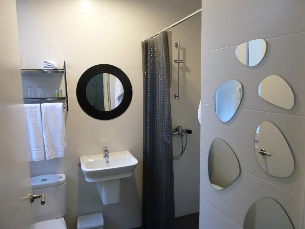 Koupelna v ubytování Hostal Lauria