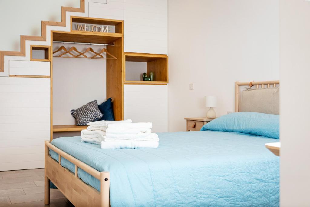 Posteľ alebo postele v izbe v ubytovaní Palamì - Polignano a Mare Holiday House