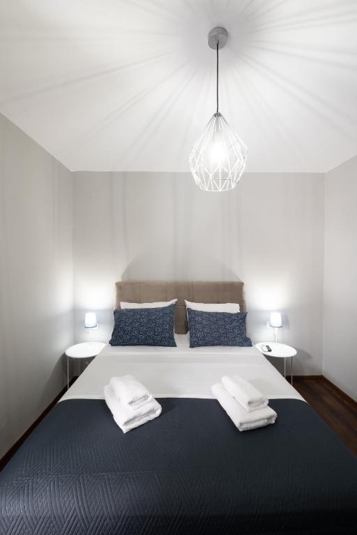 Postel nebo postele na pokoji v ubytování Chania Central Apartment