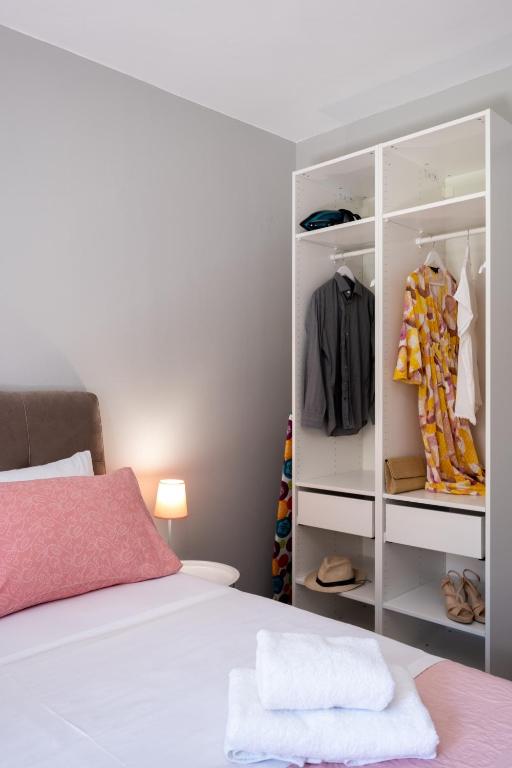 Postel nebo postele na pokoji v ubytování Chania Central Apartment
