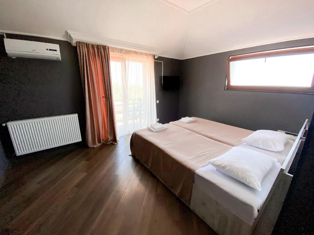 Postel nebo postele na pokoji v ubytování Chateau ikalto