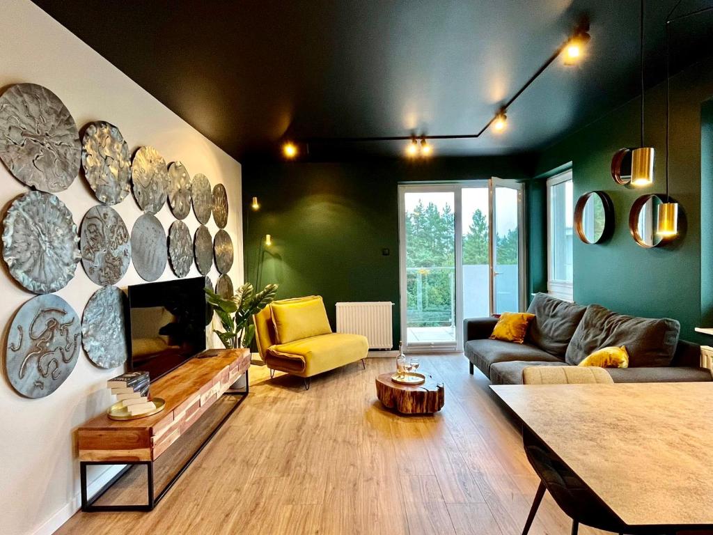 Posedenie v ubytovaní Apartament Cobena