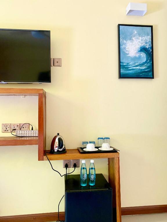 TV a/nebo společenská místnost v ubytování Sands Grand