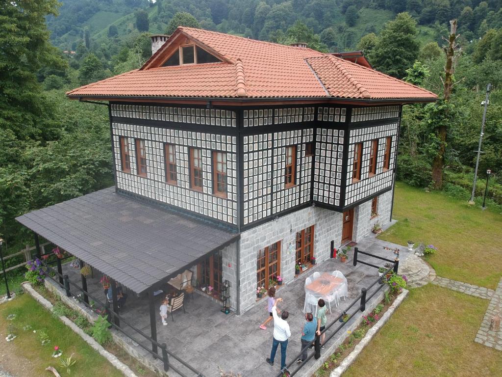 an overhead view of a house with people standing outside at Vice's Konağı in Fındıklı