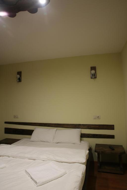 Postel nebo postele na pokoji v ubytování Cheremosh