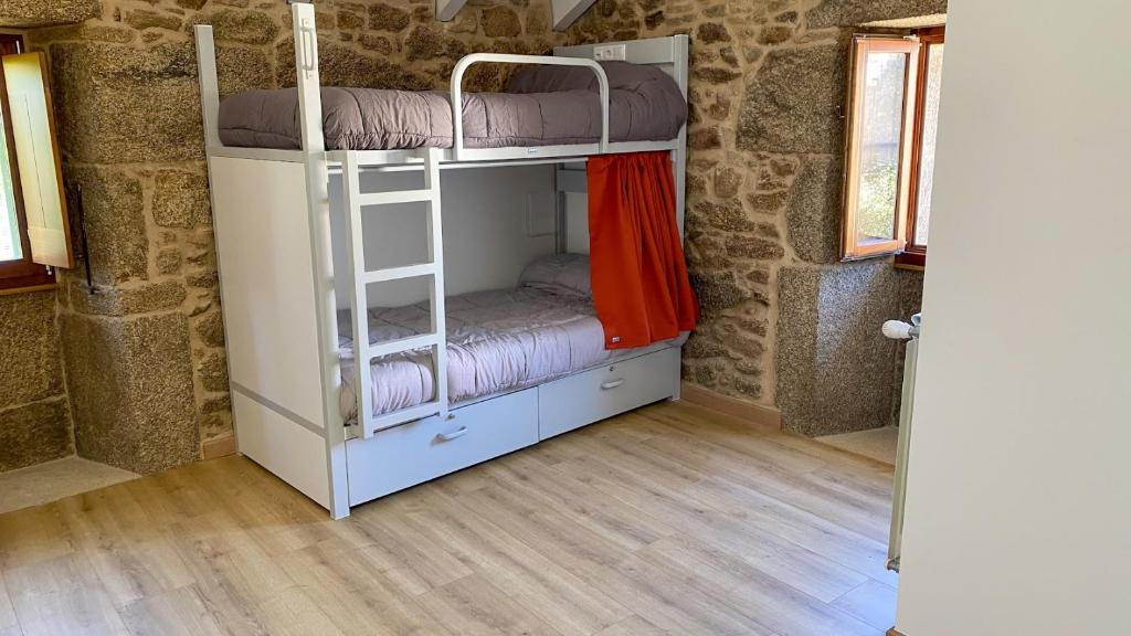 Postel nebo postele na pokoji v ubytování A Casa Do Boi