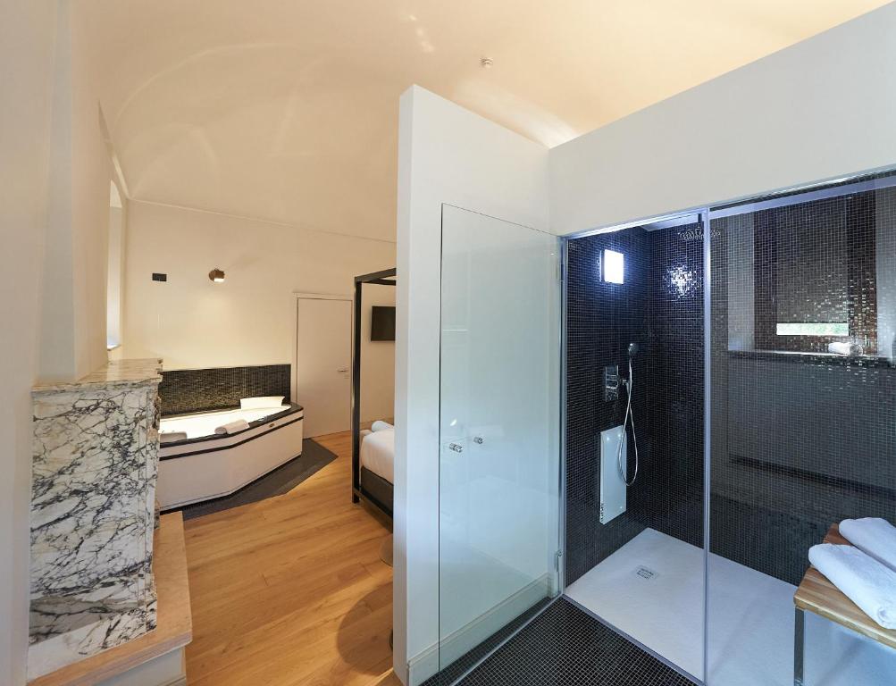 Postel nebo postele na pokoji v ubytování RELAIS CASCINA ERA