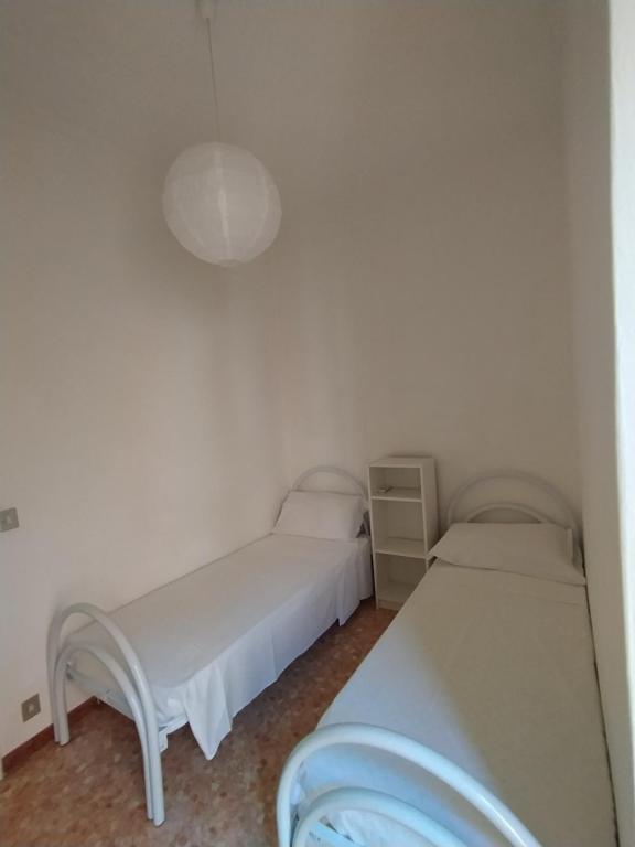 A bed or beds in a room at Brezza marina