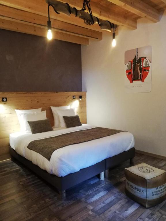 Postel nebo postele na pokoji v ubytování Un R de Mémises