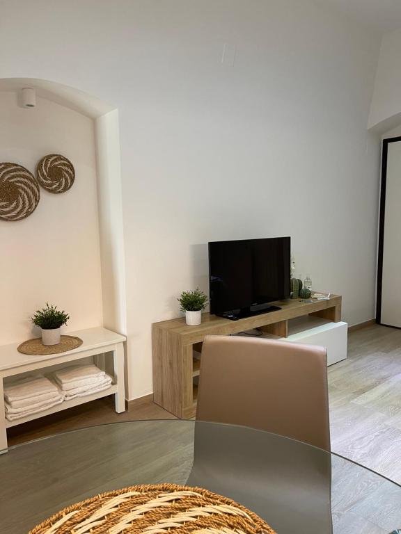 Telewizja i/lub zestaw kina domowego w obiekcie Secondo 23