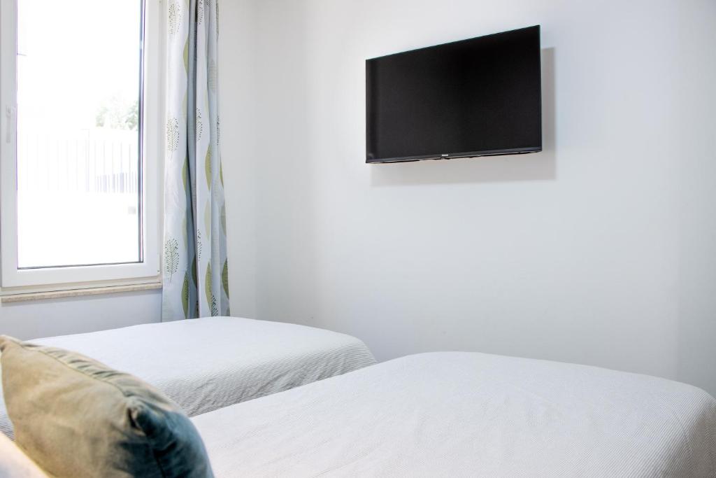 Posteľ alebo postele v izbe v ubytovaní Luxury apartment Casia with heated pool and pleasent terrace