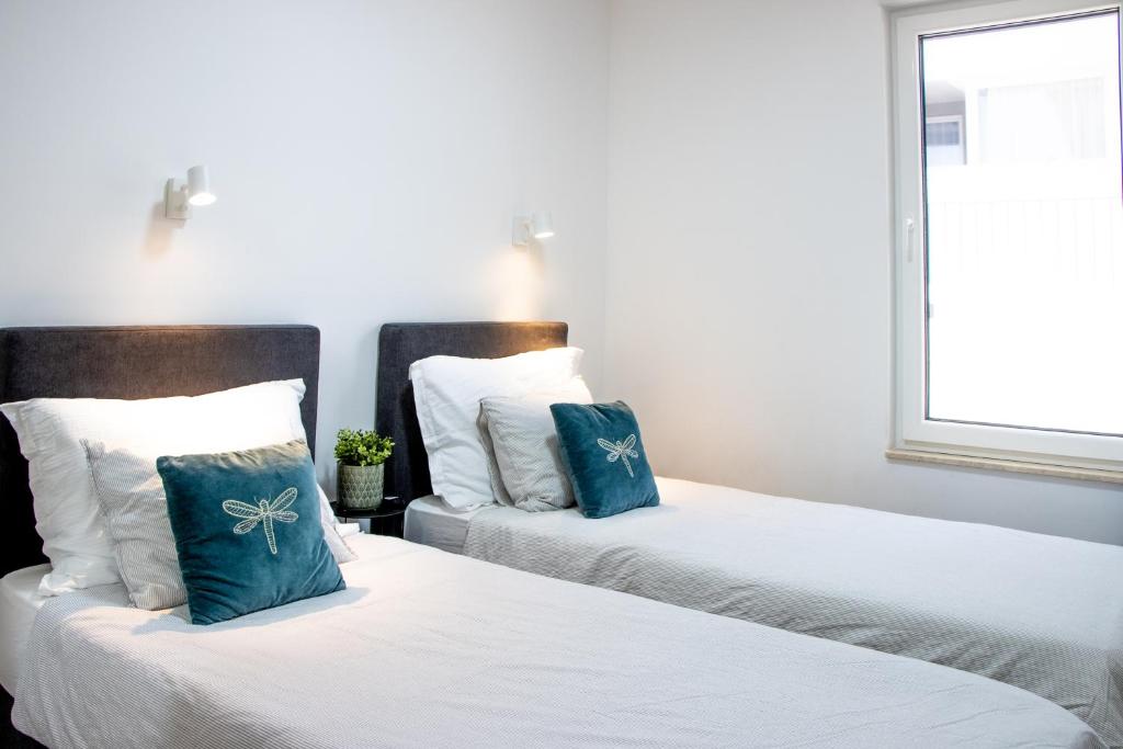 Posteľ alebo postele v izbe v ubytovaní Luxury apartment Casia with heated pool and pleasent terrace