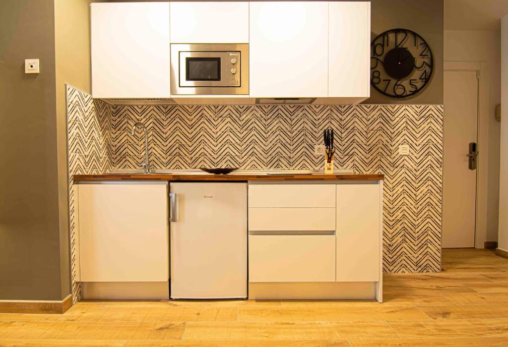Kuchnia lub aneks kuchenny w obiekcie Apartamentos Leonor
