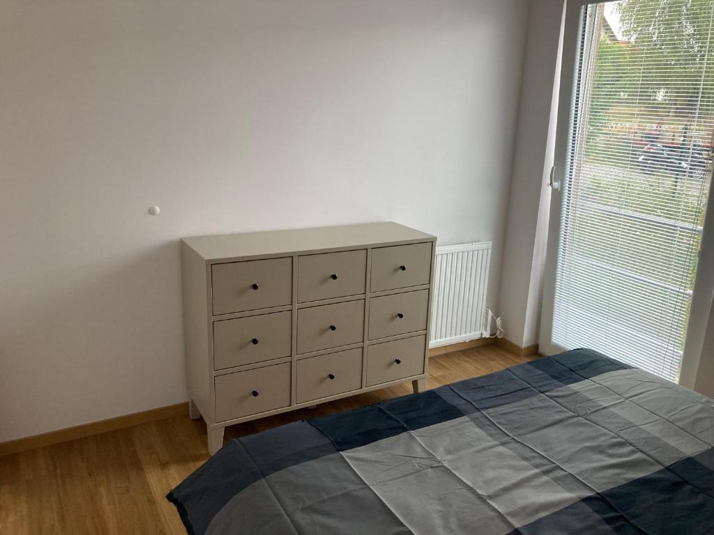 Łóżko lub łóżka w pokoju w obiekcie Dům U Lipky