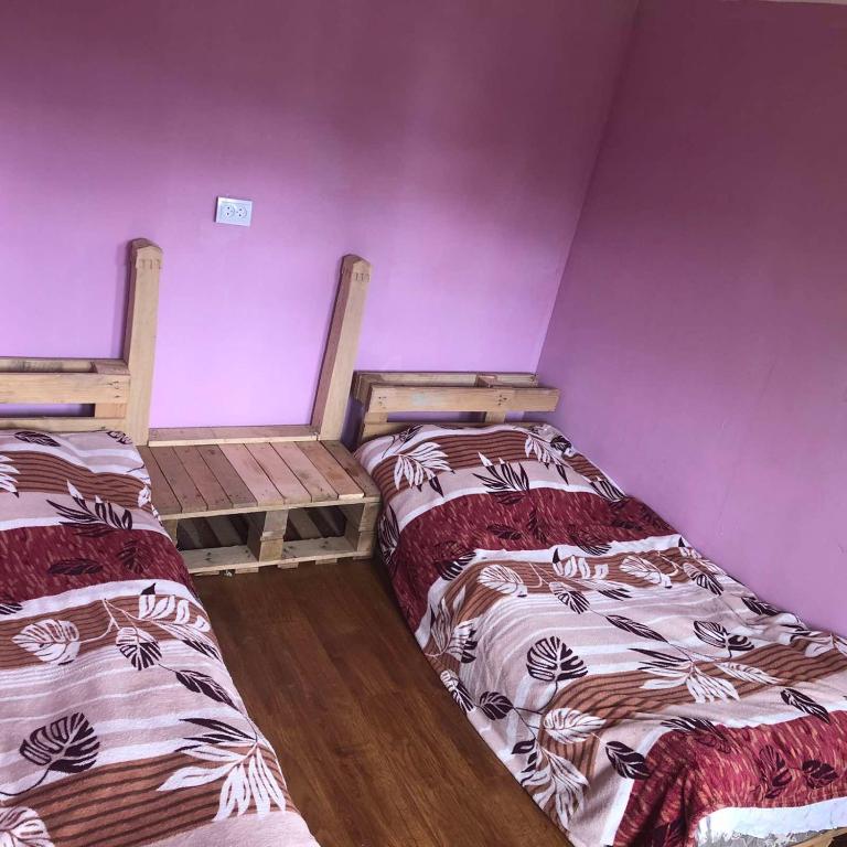 Postel nebo postele na pokoji v ubytování Guest House Gvidani