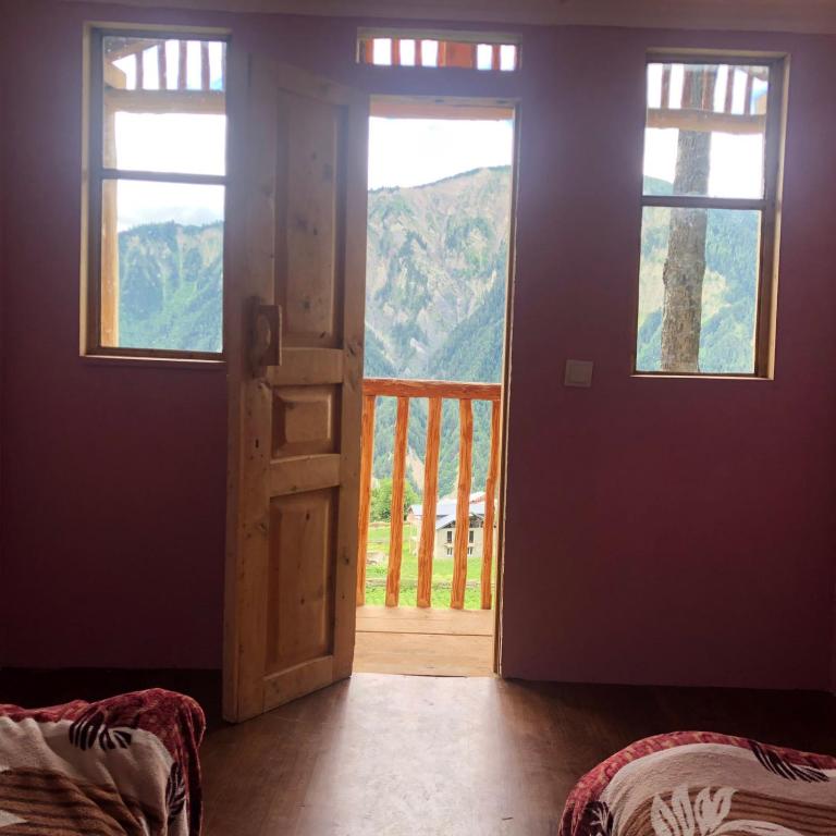 Postel nebo postele na pokoji v ubytování Guest House Gvidani